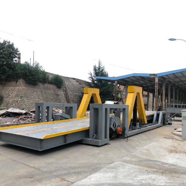 液压翻板卸车机图片