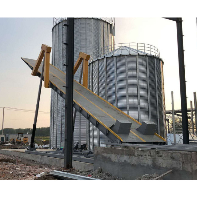 液压翻板卸车机图片